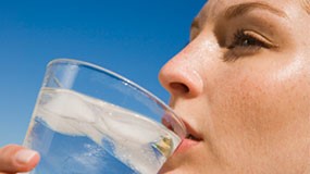 — title missing — Close-up photos of a person's face with the person drinking a glass of water.